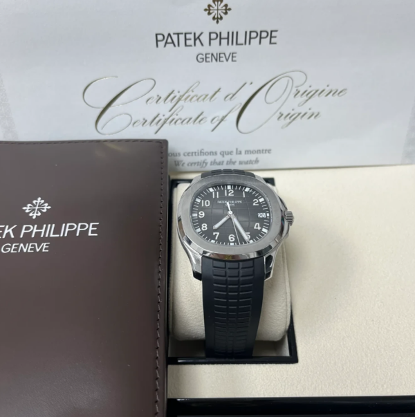 Pre-Owned USA | Patek Philippe Aquanaut bitcoin, crypto, luxury watches papers